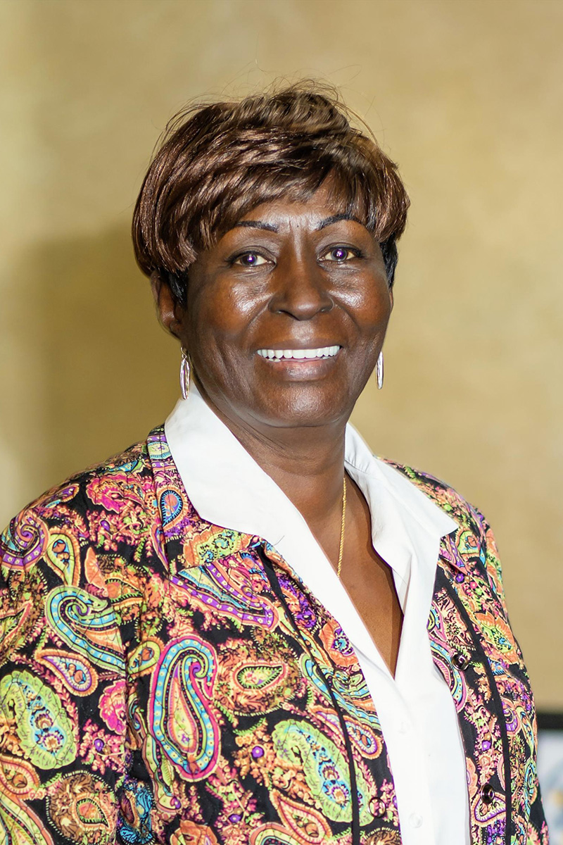 A smiling patient after a full-mouth restoration